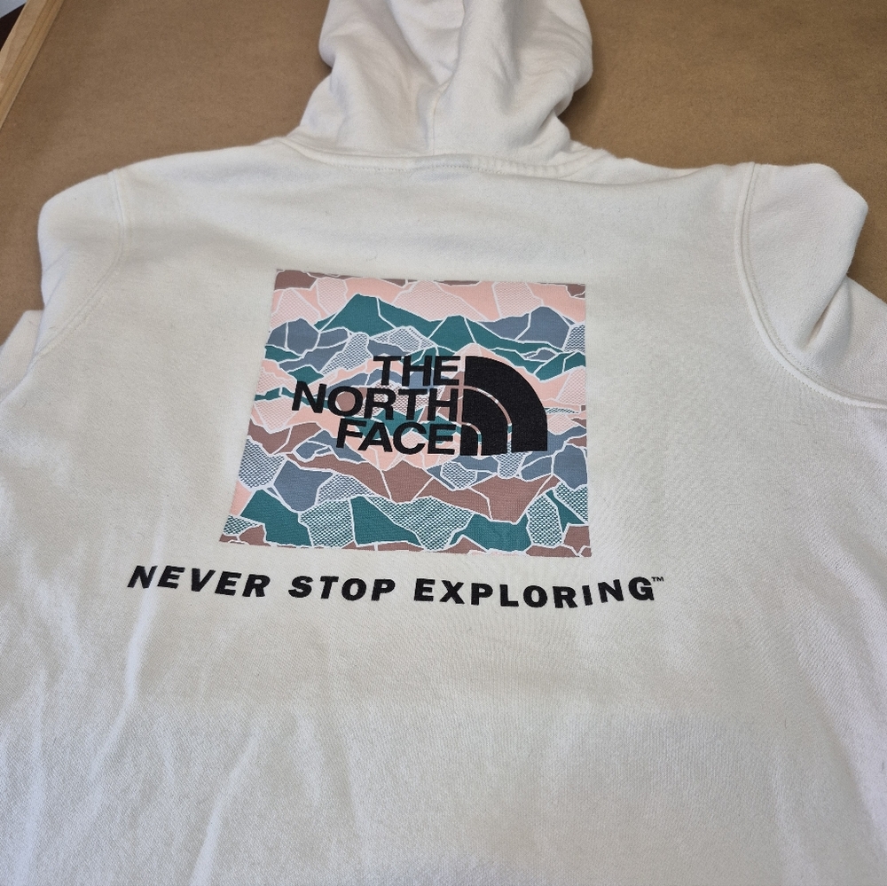 The North Face White Hoodie with Multicolor Mountain Graphic
